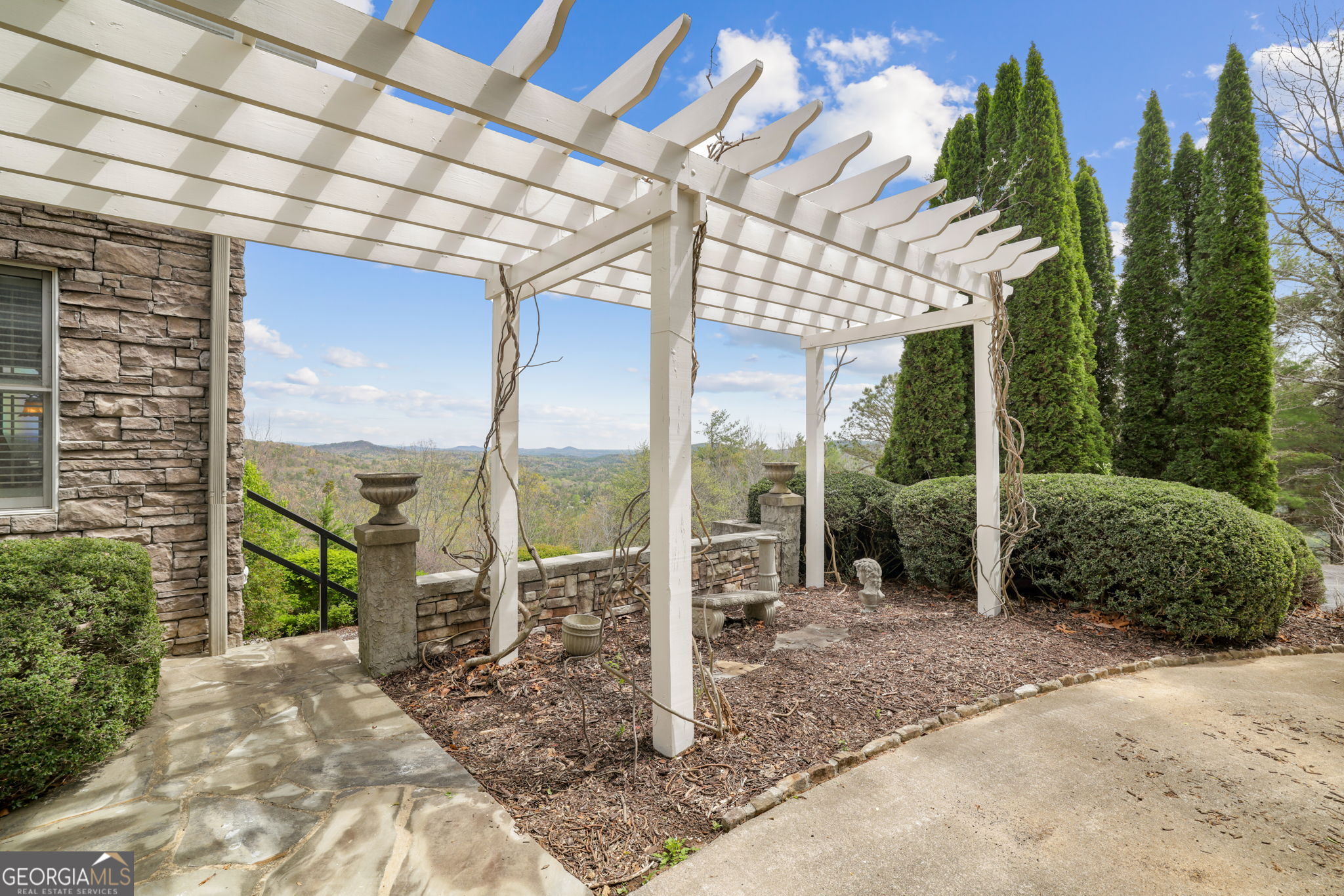 1171 Rabun Bluffs Drive Lakemont, GA 30552 - Photo 67 of 75 a view of a chair and tables in the patio