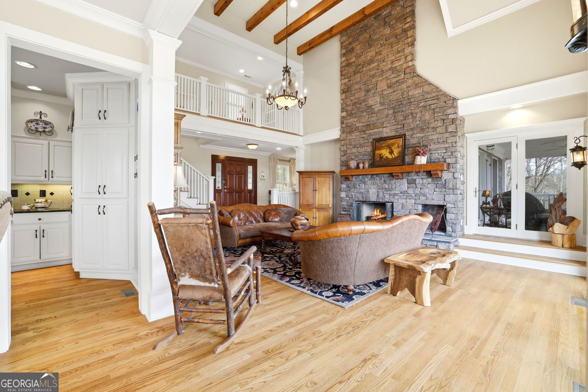 1171 Rabun Bluffs Drive Lakemont, GA 30552 - Photo 10 of 75 a living room with furniture a dining table and chairs with wooden floor