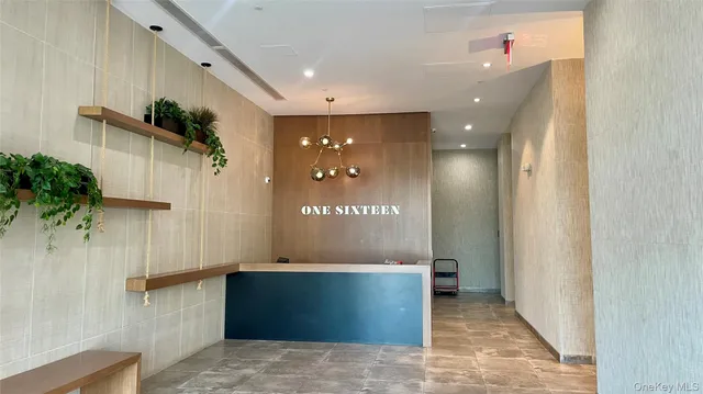 a view of a hallway with entryway