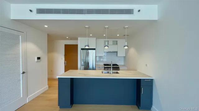 a view of kitchen and sink