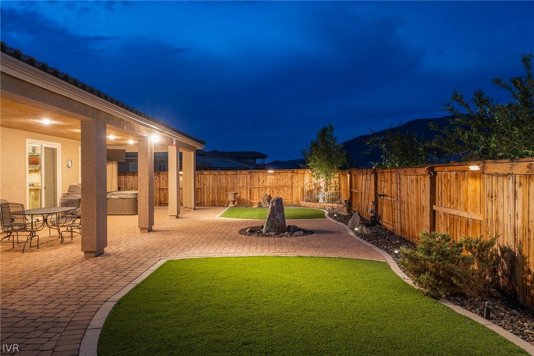 9910 Copenhagen Way Reno, NV 89521 - Photo 17 of 22 a swimming pool with outdoor seating and yard