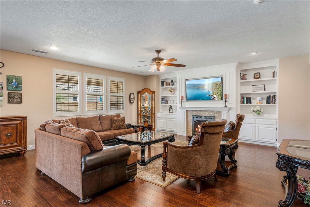 9910 Copenhagen Way Reno, NV 89521 - Photo 7 of 22 a living room with furniture and a large window