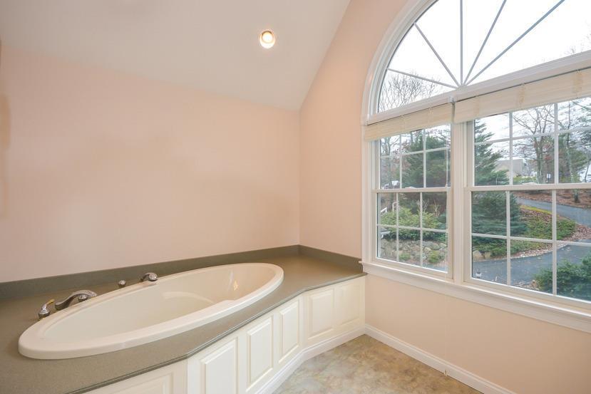 113 James Circle Mashpee, MA 02649 - Photo 16 of 29 an empty room with a window