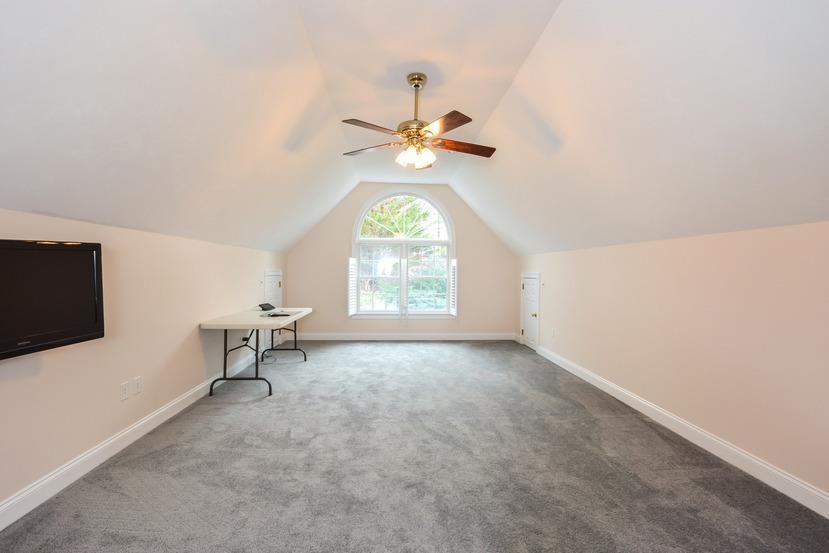 113 James Circle Mashpee, MA 02649 - Photo 17 of 29 wooden floor in an empty room with a window