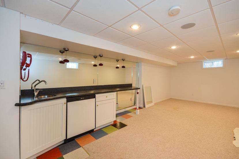 113 James Circle Mashpee, MA 02649 - Photo 18 of 29 en suite bathroom with a sink and a mirror