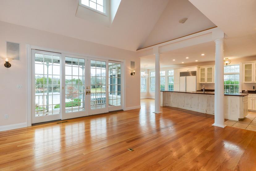 113 James Circle Mashpee, MA 02649 - Photo 7 of 29 a view of a room with wooden floor and a large window