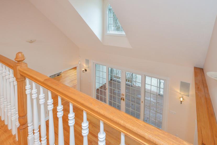 113 James Circle Mashpee, MA 02649 - Photo 10 of 29 a view of staircase with white walls and a window