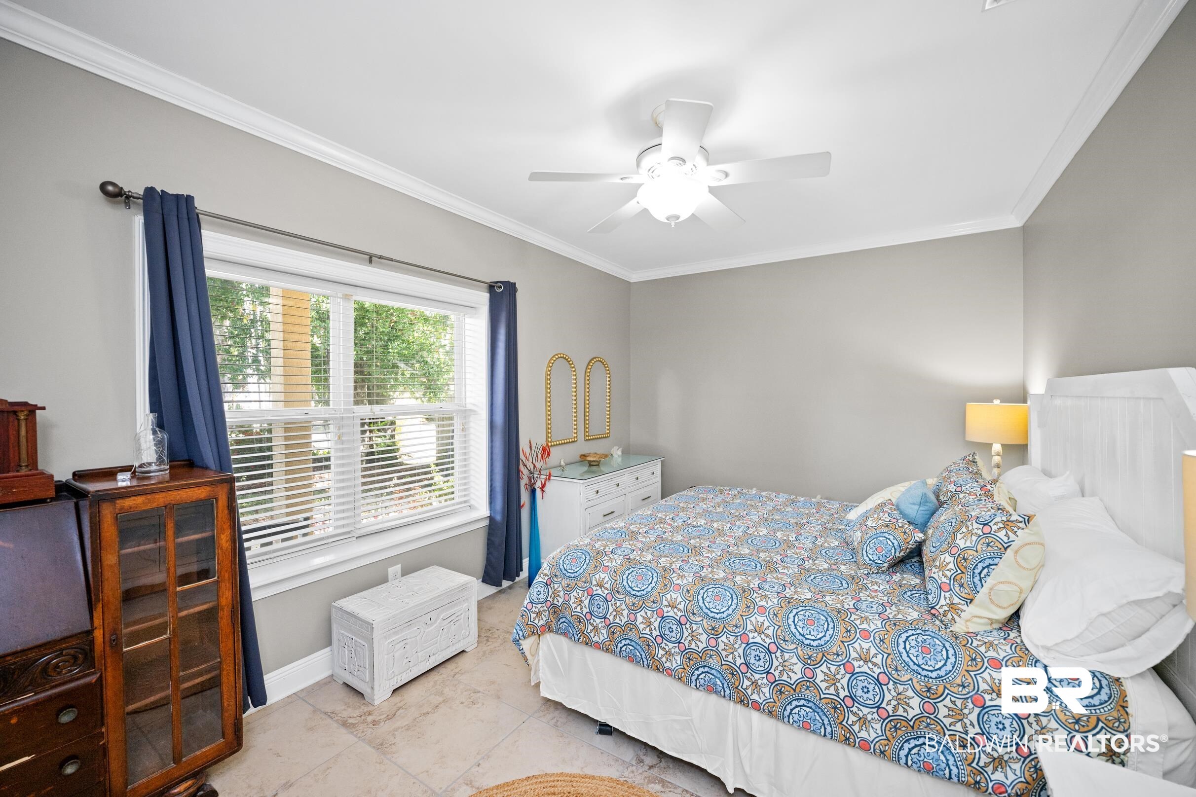 5217 Greentree Road Orange Beach, AL 36561 - Photo 51 of 58 Bedroom with crown molding and a ceiling fan