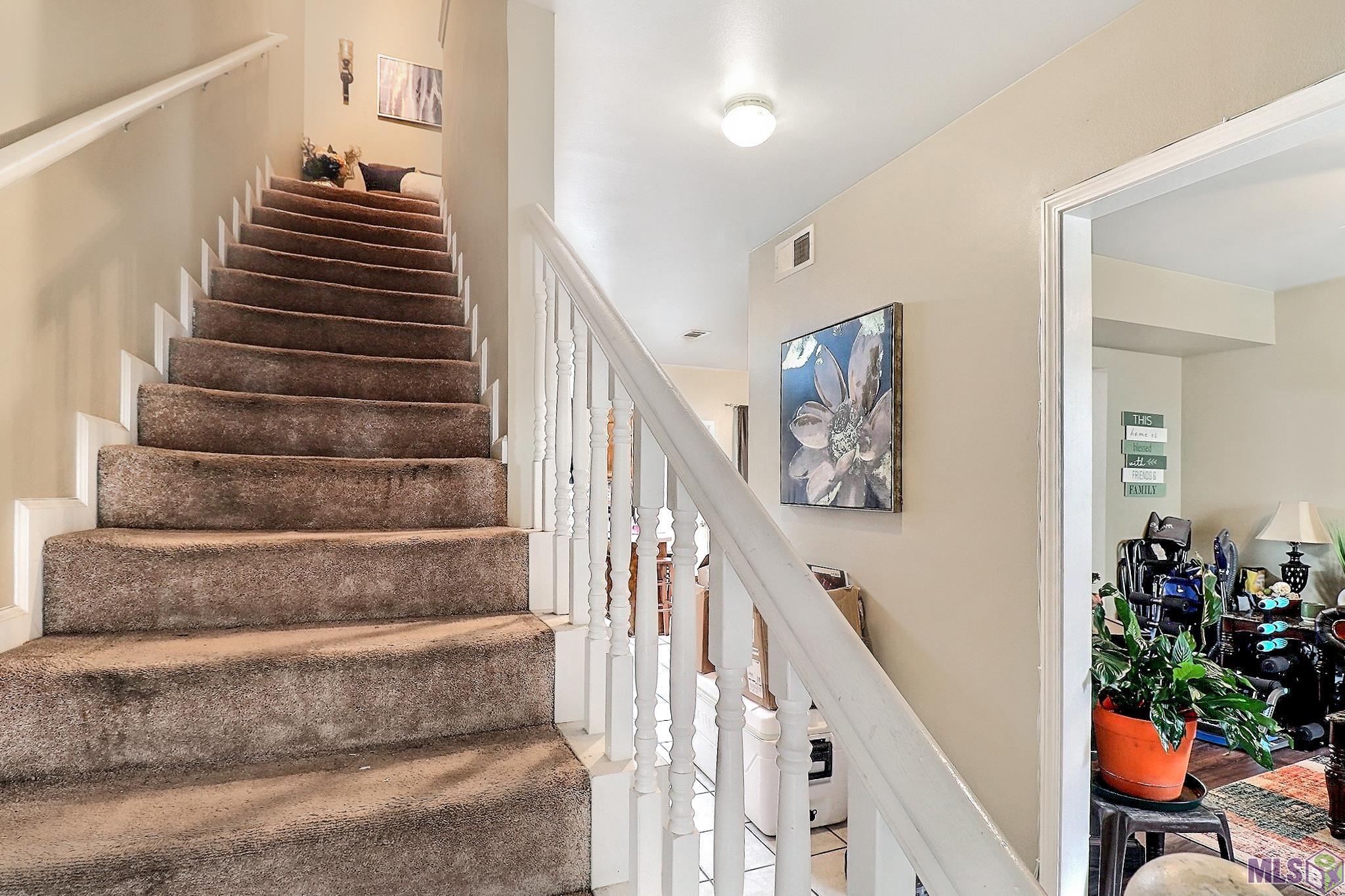 678 Gloria Drive, Unit 10 Baton Rouge, LA 70819 - Photo 13 of 28 Unit 9 interior stairwell