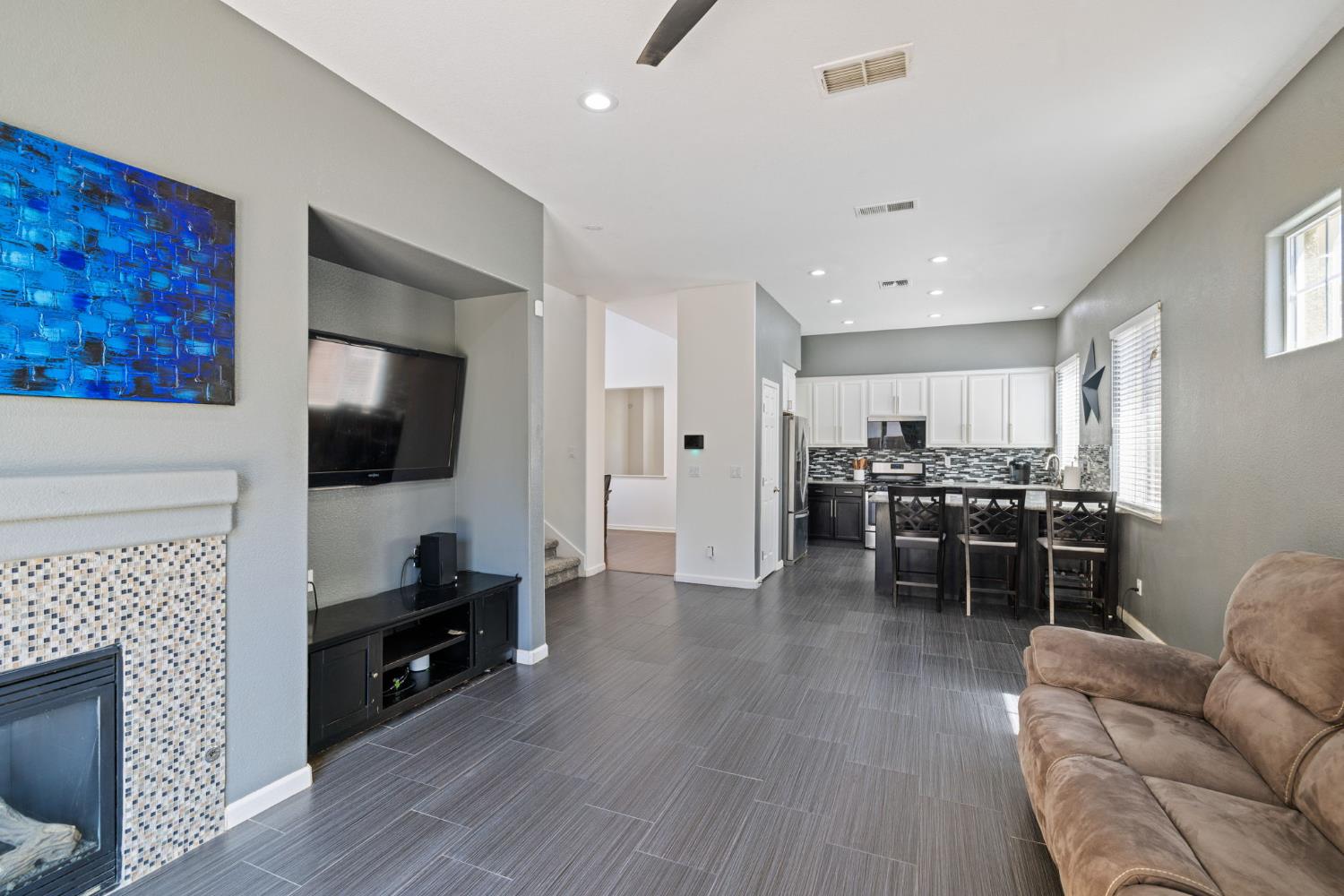 562 Ranger Street Oakdale, CA 95361 - Photo 20 of 63 Family room with tile flooring overseeing kitchen combo area