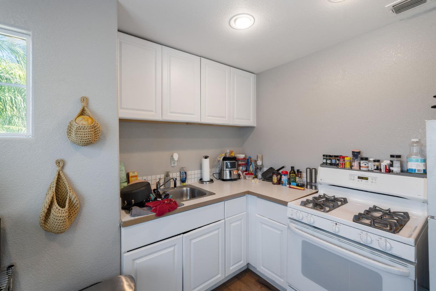 562 Ranger Street Oakdale, CA 95361 - Photo 53 of 63 Apartment (ADU) kitchen with stainless steel sink, gas range & oven