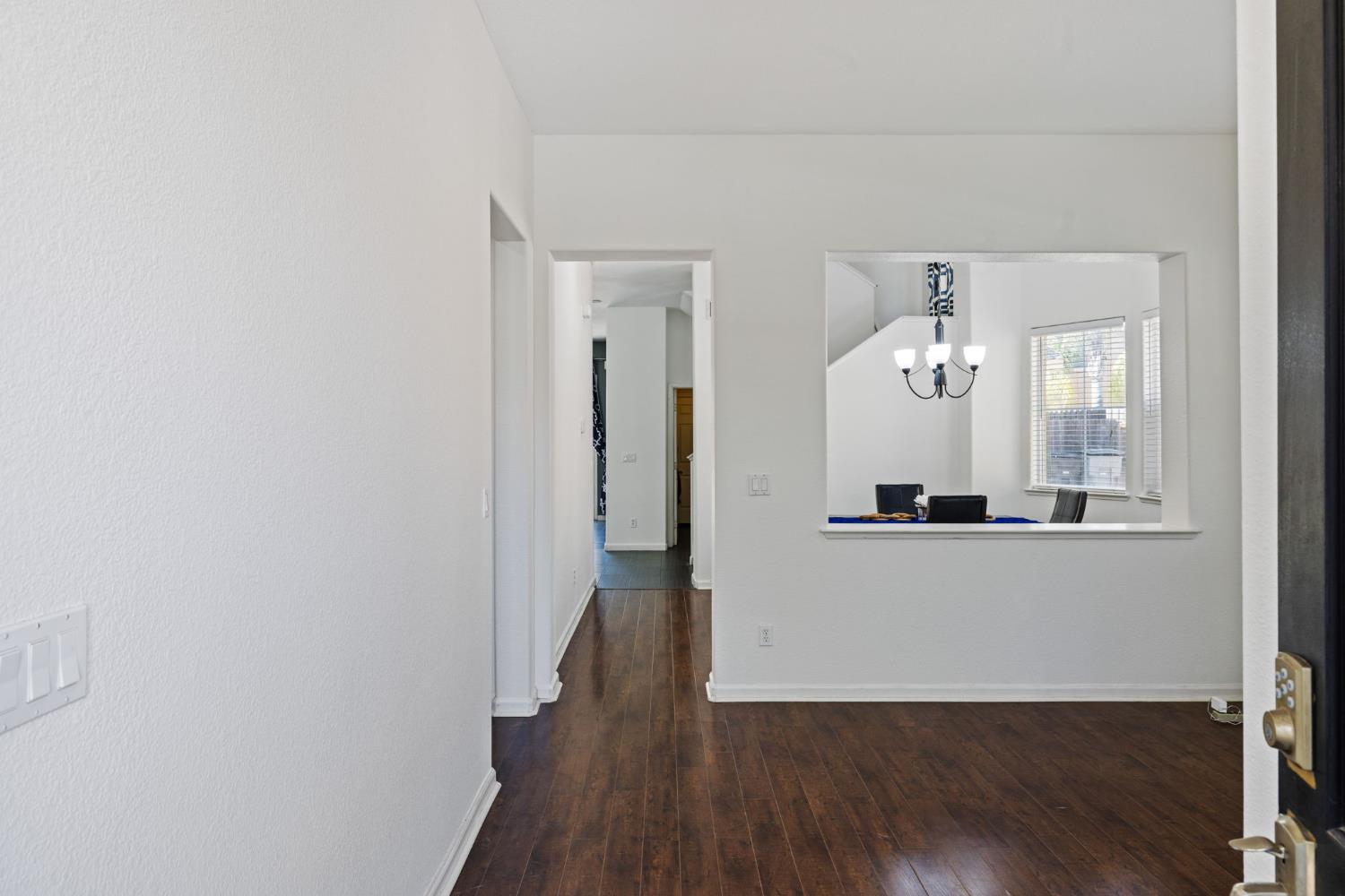 562 Ranger Street Oakdale, CA 95361 - Photo 6 of 63 Front entrance showing hallway and living room