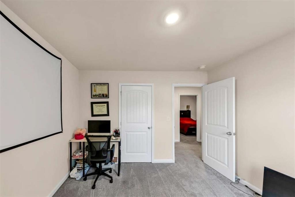 3737 Makeover Court Atlanta, GA 30349 - Photo 19 of 34 a view of livingroom with hardwood