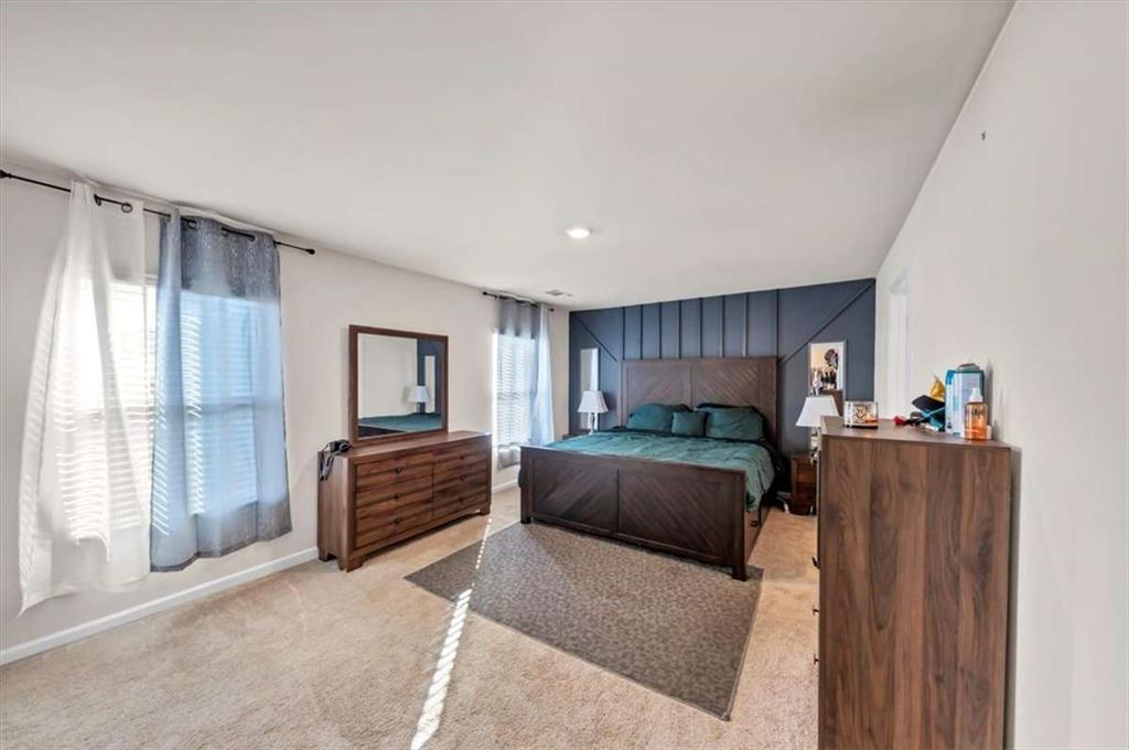 3737 Makeover Court Atlanta, GA 30349 - Photo 26 of 34 a living room with furniture and a window