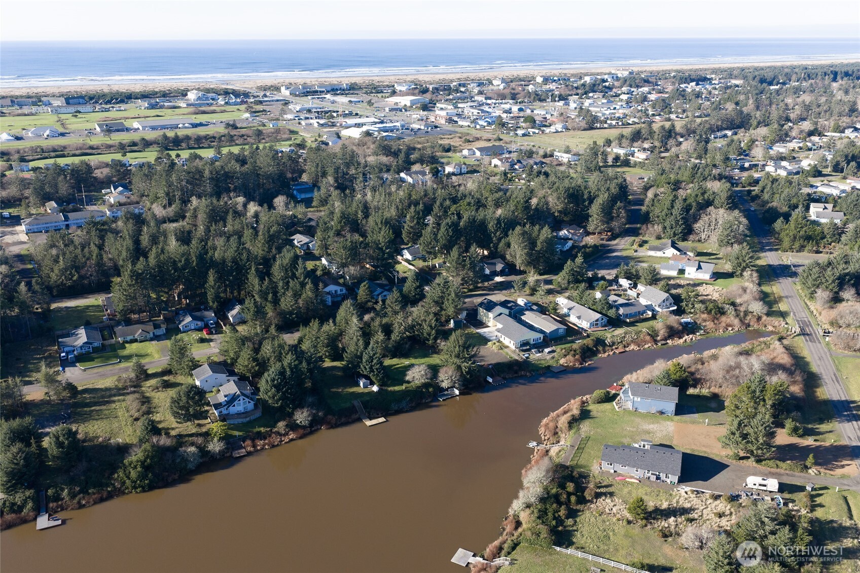 636 Weatherwax Loop Northeast Ocean Shores, WA 98569 - Photo 27 of 32 an aerial view of a city