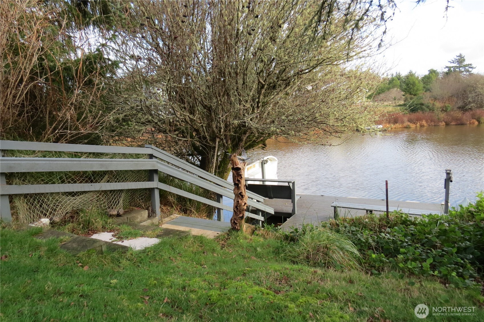 636 Weatherwax Loop Northeast Ocean Shores, WA 98569 - Photo 10 of 32 a house view with a garden space