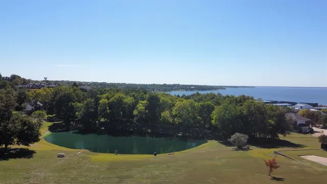 a view of a lake with a city