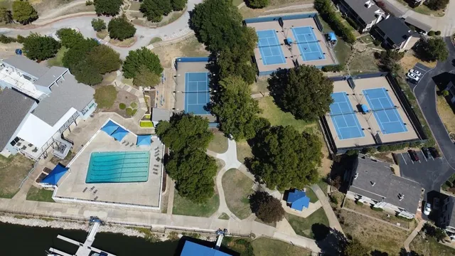 an aerial view of houses with outdoor space