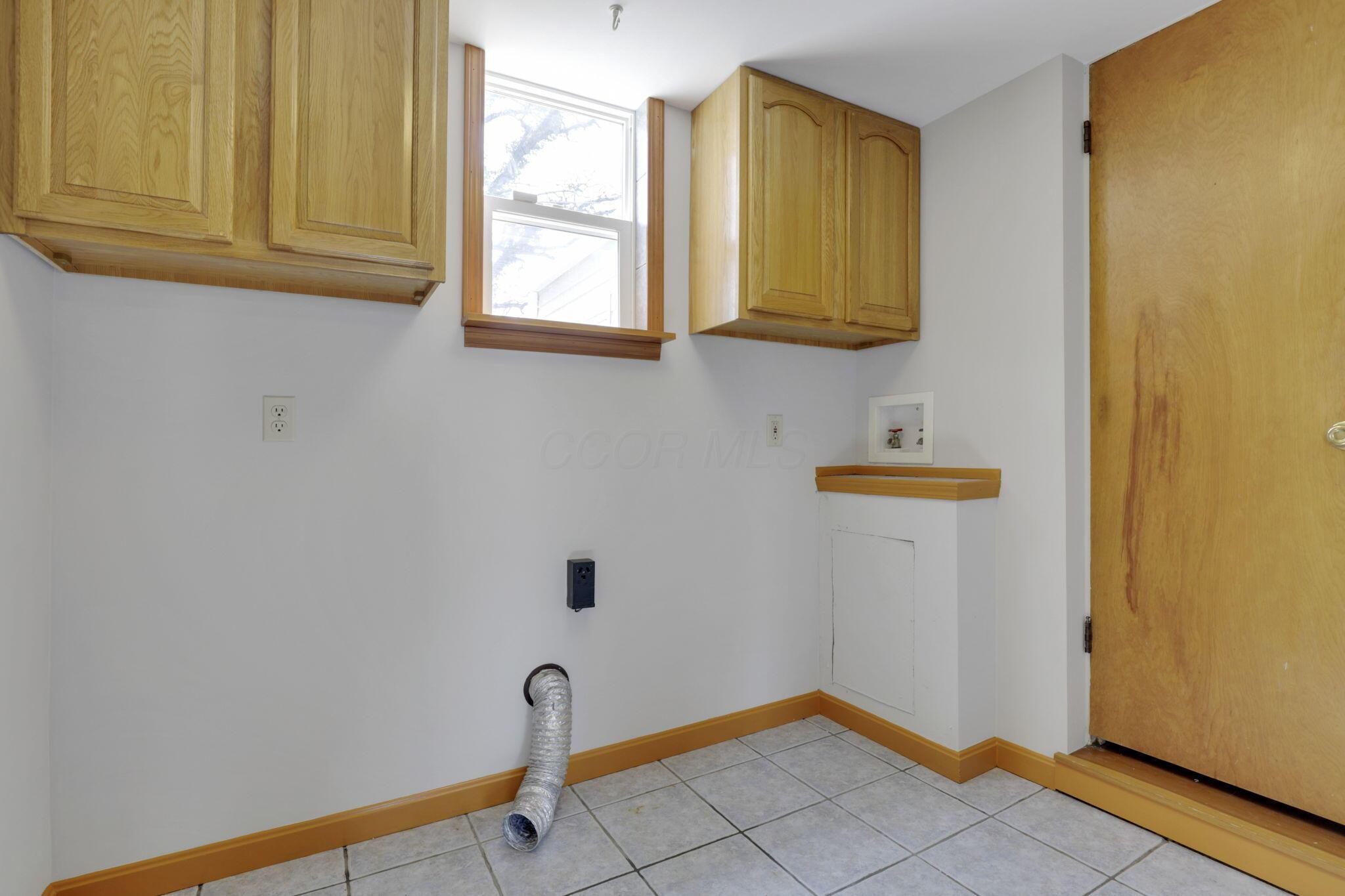410 Sturbridge Road Columbus, OH 43228 - Photo 13 of 32 Laundry Room