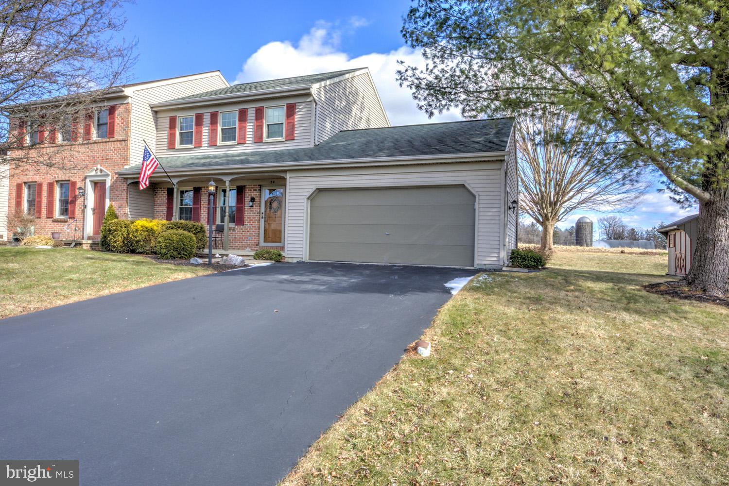 34 Brookview Drive Lititz, PA 17543 - Photo 3 of 36 a front view of a house with garden