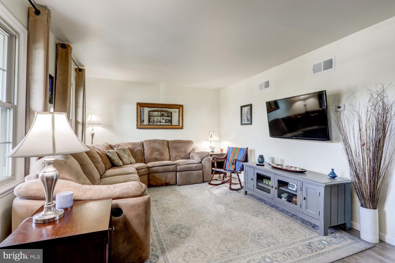 34 Brookview Drive Lititz, PA 17543 - Photo 5 of 36 a living room with furniture and a flat screen tv
