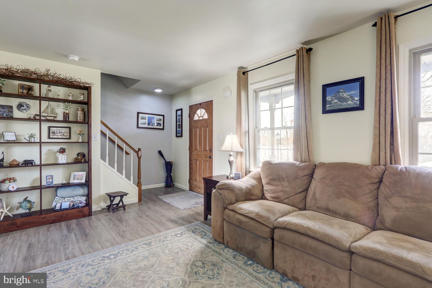 34 Brookview Drive Lititz, PA 17543 - Photo 6 of 36 a living room with furniture and a book shelf