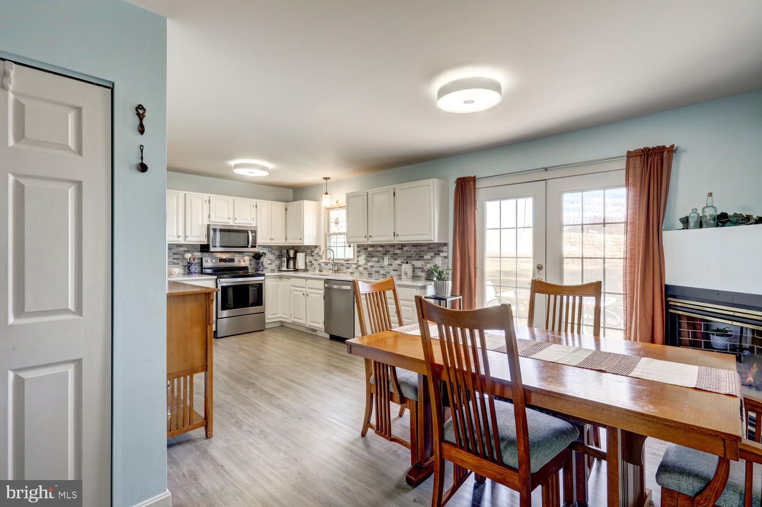 34 Brookview Drive Lititz, PA 17543 - Photo 8 of 36 a view of kitchen with refrigerator a stove and furniture