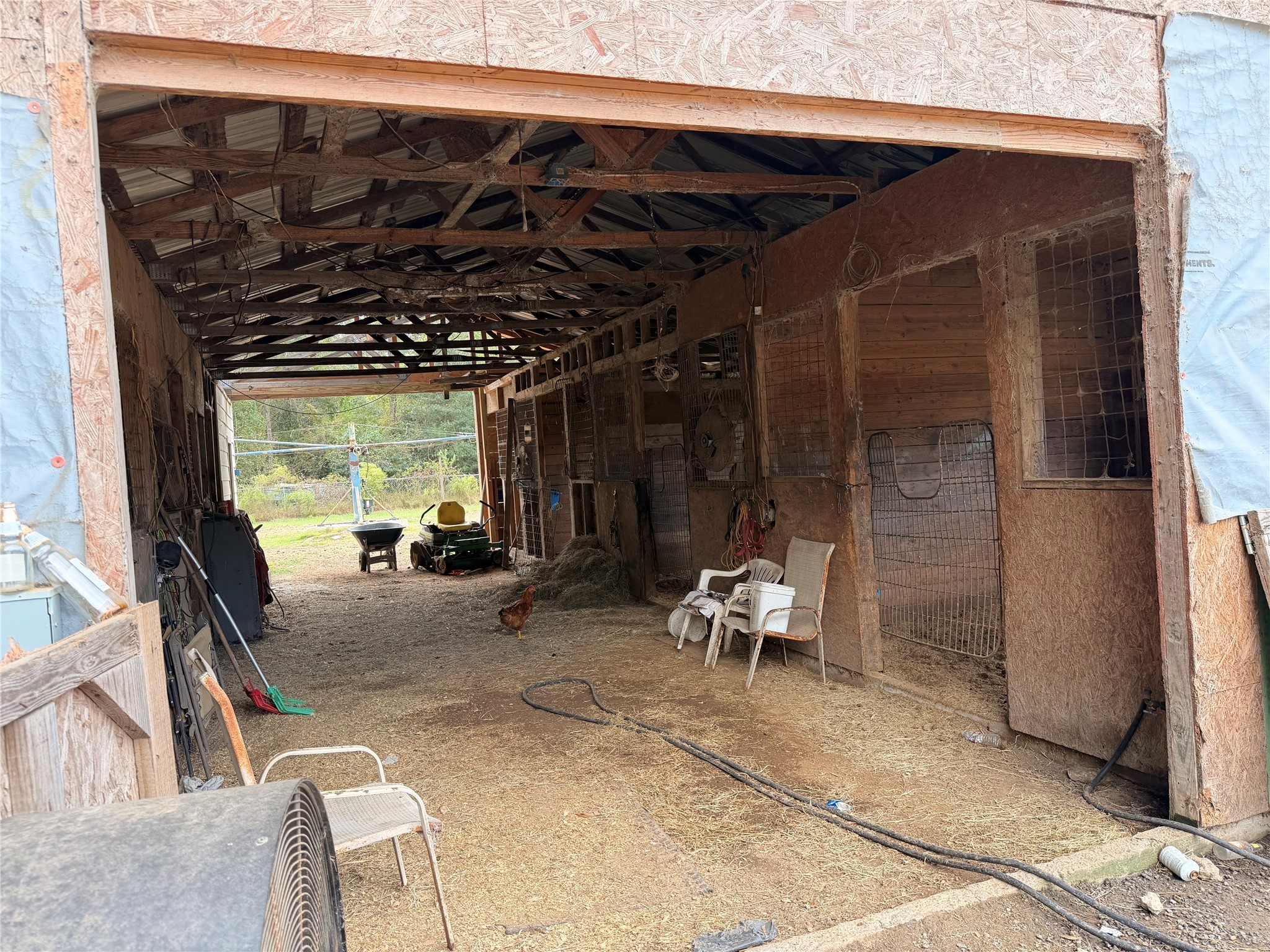 62 Short Leaf Drive Huffman, TX 77336 - Photo 20 of 33 a view of a chairs and table in a patio