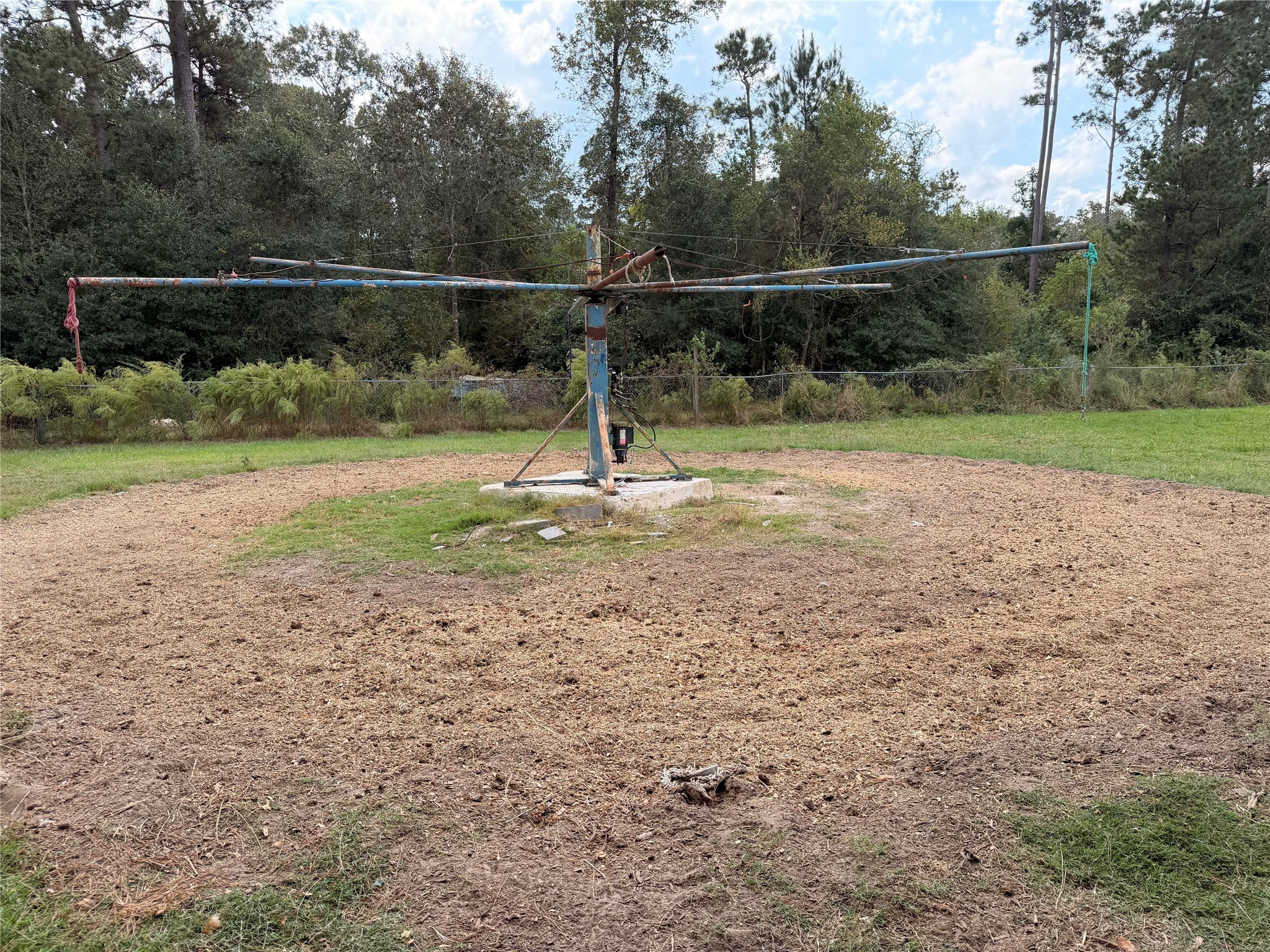 62 Short Leaf Drive Huffman, TX 77336 - Photo 25 of 33 a backyard of a house with lots of green space