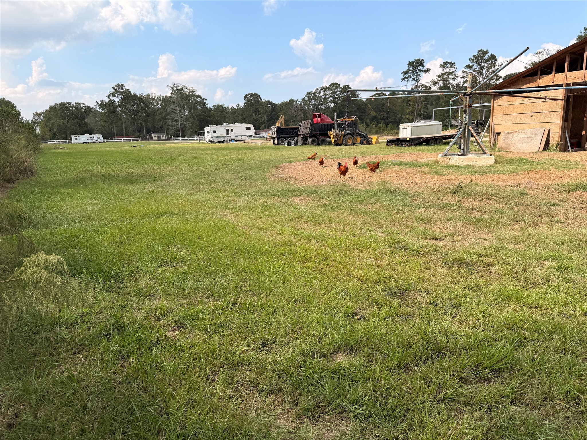 62 Short Leaf Drive Huffman, TX 77336 - Photo 30 of 33 a view of a yard with an outdoor space