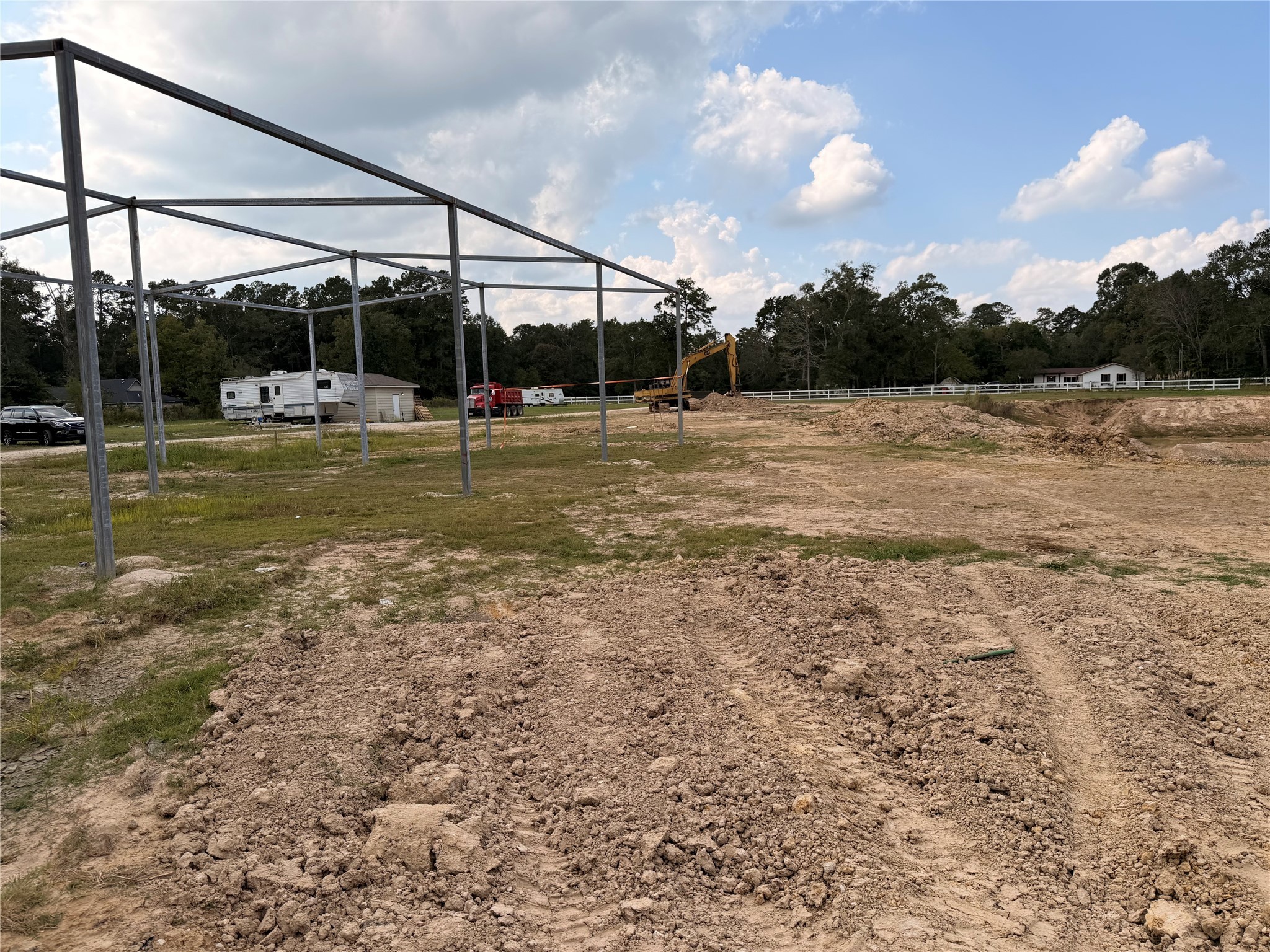 62 Short Leaf Drive Huffman, TX 77336 - Photo 31 of 33 a view of a house with a yard