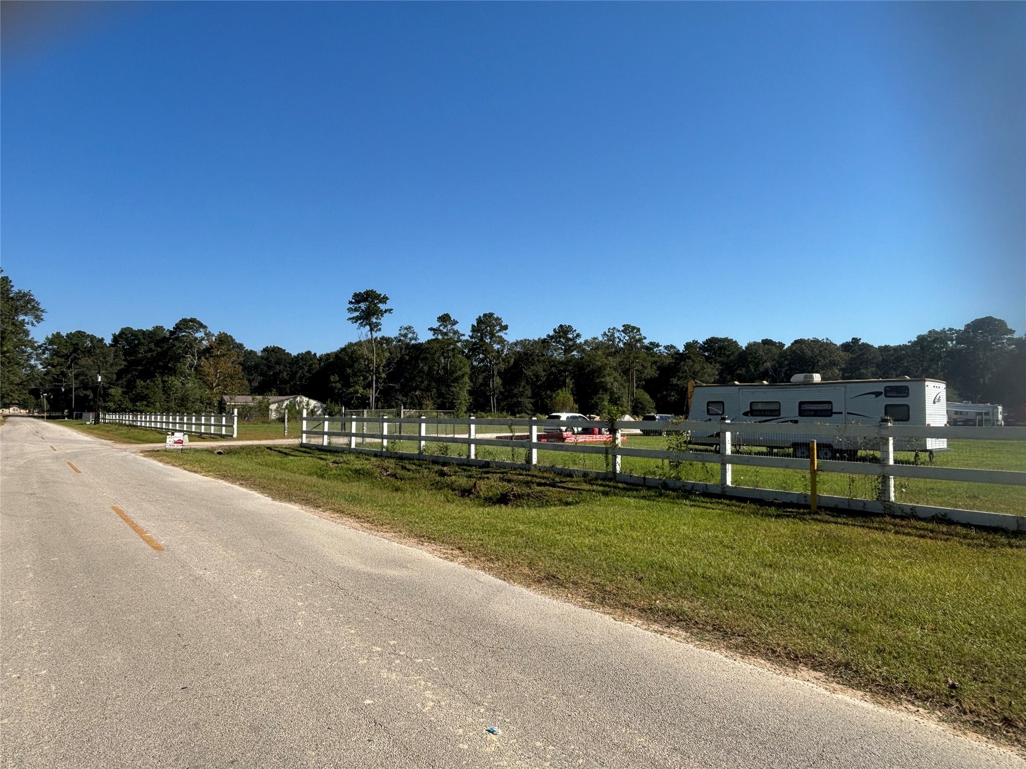 62 Short Leaf Drive Huffman, TX 77336 - Photo 4 of 33 a view of a lake with houses in the background