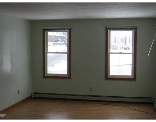 247 Plantation Street Worcester, MA 01604 - Photo 3 of 5 a view of an empty room with a window