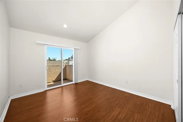a view of a living room and kitchen