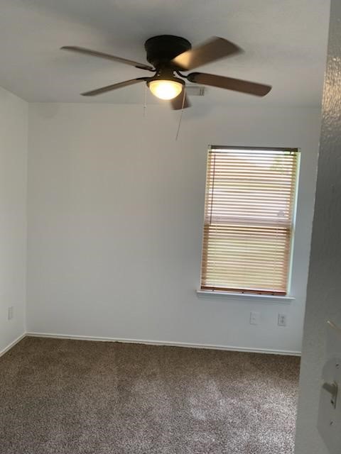 9530 Alex Springs Lane Houston, TX 77044 - Photo 4 of 8 a view of an empty room with a window
