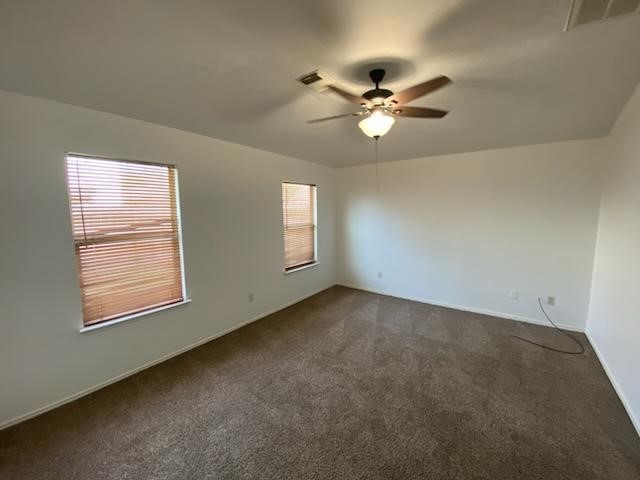 9530 Alex Springs Lane Houston, TX 77044 - Photo 6 of 8 a view of an empty room with a window