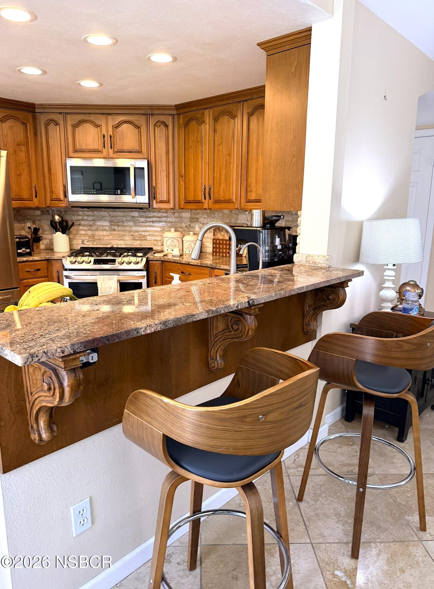 1309 Stonebrook Drive Lompoc, CA 93436 - Photo 4 of 45 Kitchen Breakfast Bar