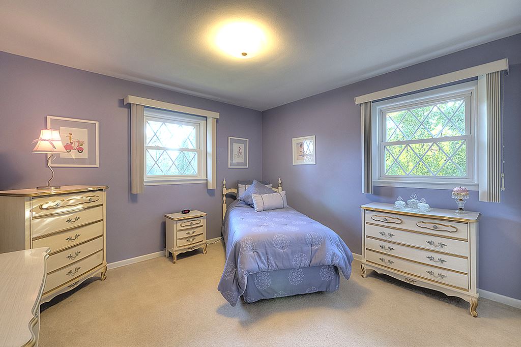 3506 North View Road Rockford, IL 61114 - Photo 17 of 25 a bedroom with a bed and a dresser