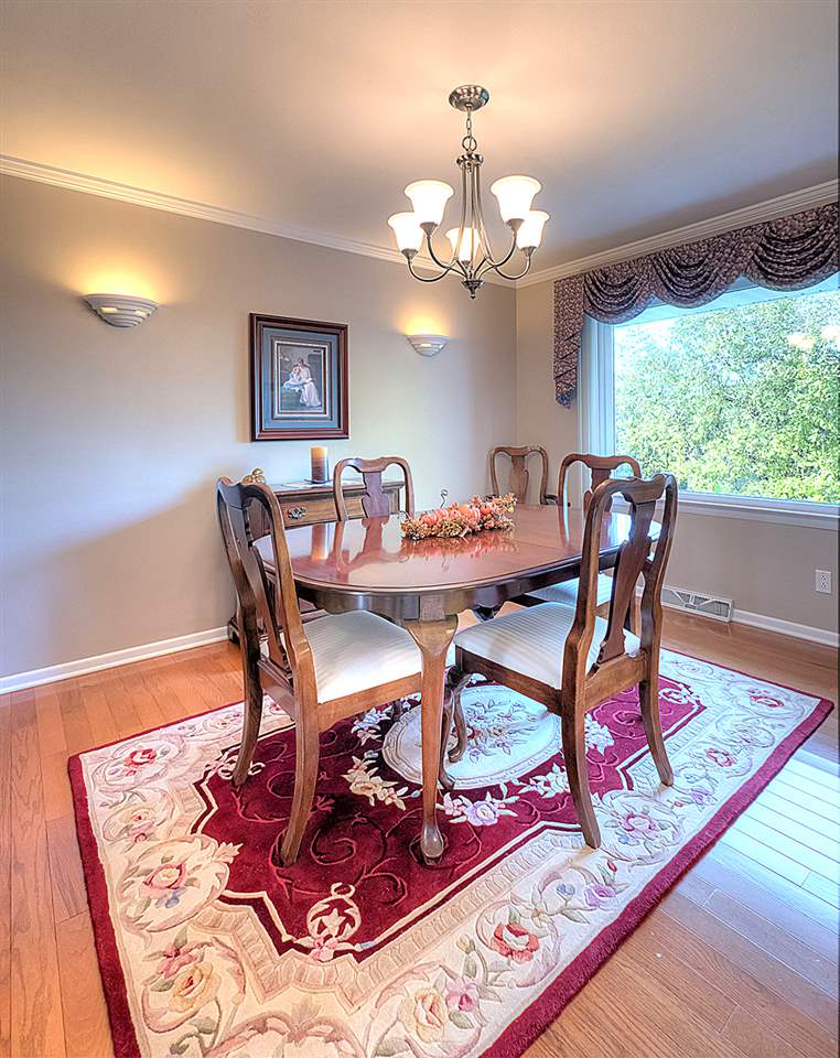 3506 North View Road Rockford, IL 61114 - Photo 5 of 25 a view of a dining room with furniture and wooden floor