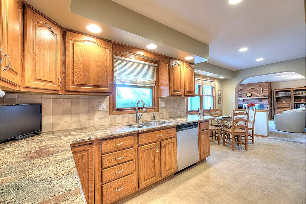 3506 North View Road Rockford, IL 61114 - Photo 6 of 25 a kitchen with lots of counter top space and furniture