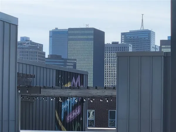 a view of balcony with a roof deck
