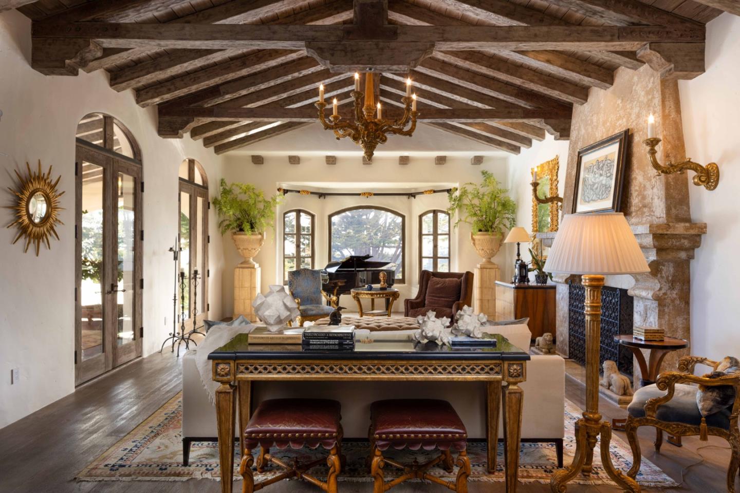 1463 Oleada Road Pebble Beach, CA 93953 - Photo 12 of 68 a view of a dining room with furniture and chandelier
