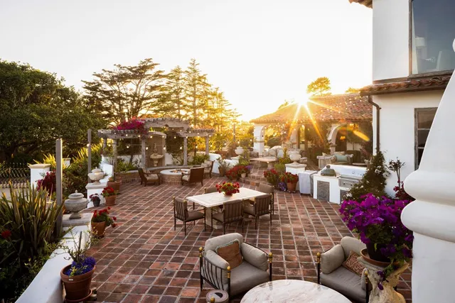 a view of a city with mountains in the background