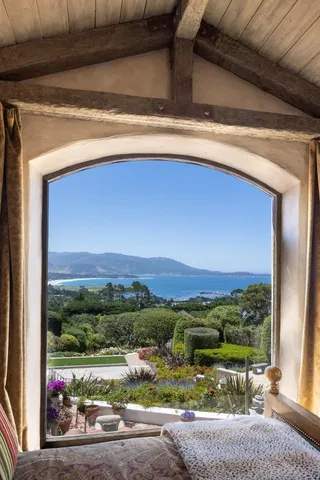 a front view of a house with yard