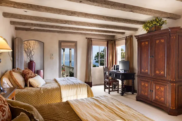 a view of a house with a tree