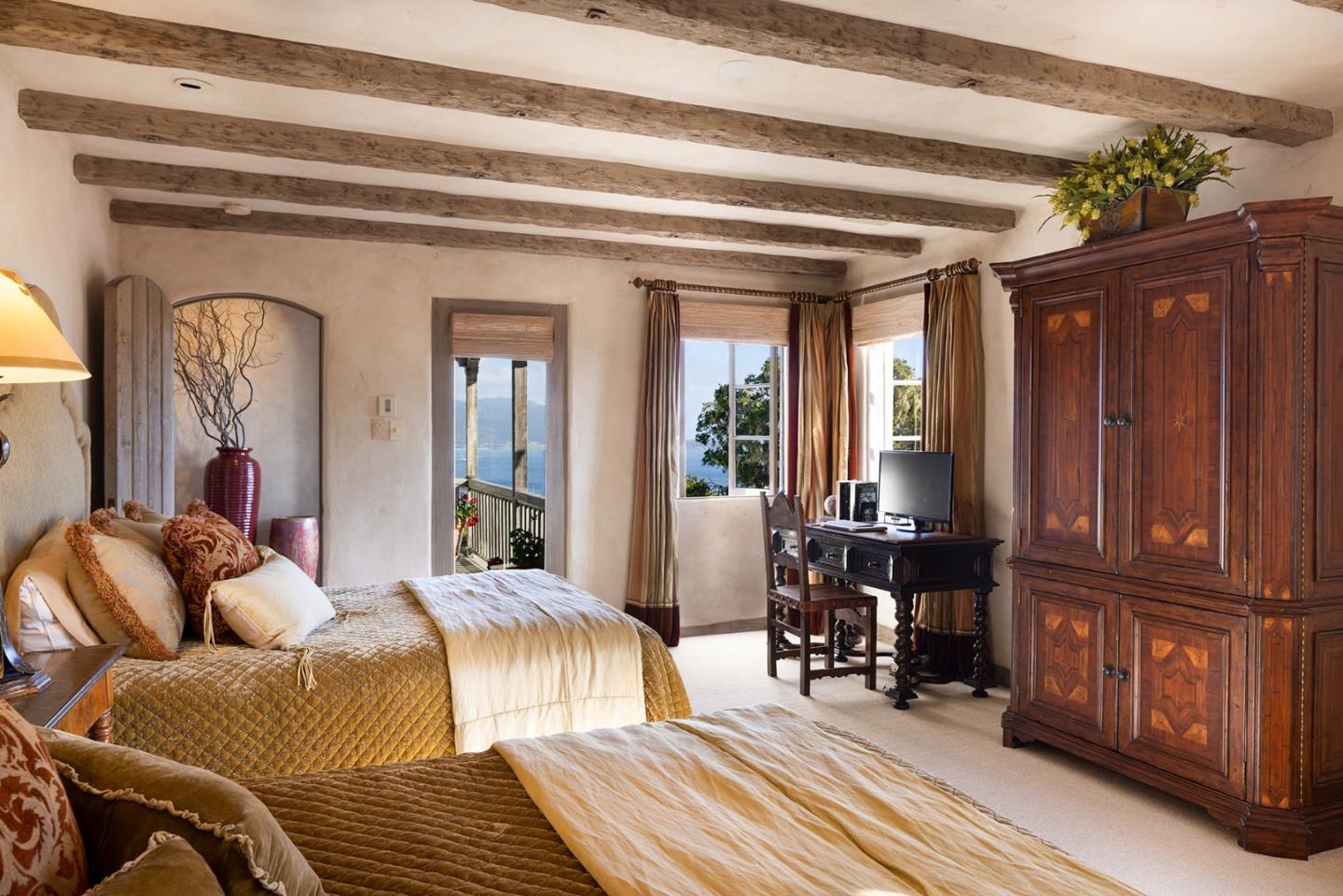 1463 Oleada Road Pebble Beach, CA 93953 - Photo 47 of 68 a living room with furniture and a fireplace