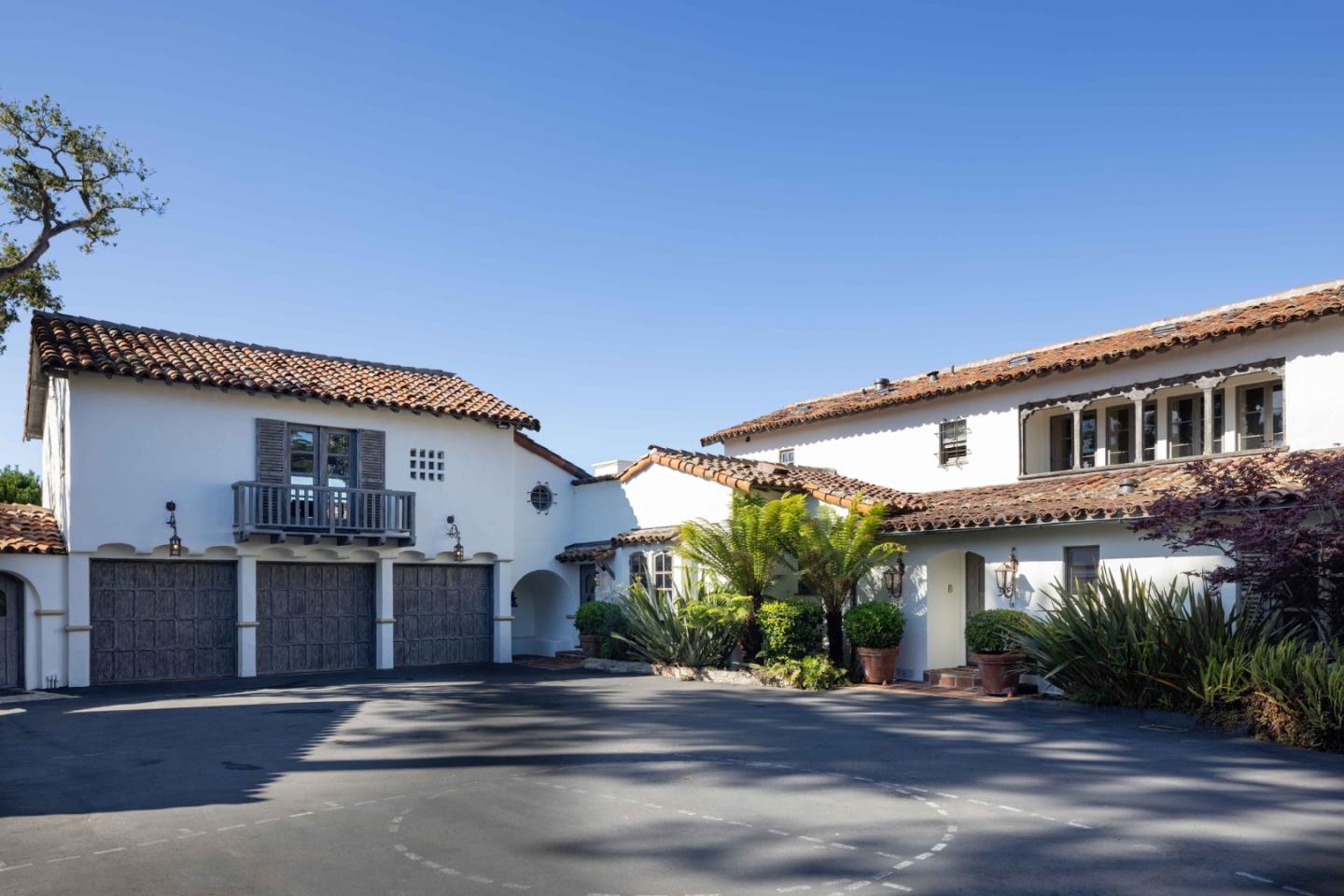 1463 Oleada Road Pebble Beach, CA 93953 - Photo 62 of 68 a front view of a house with yard