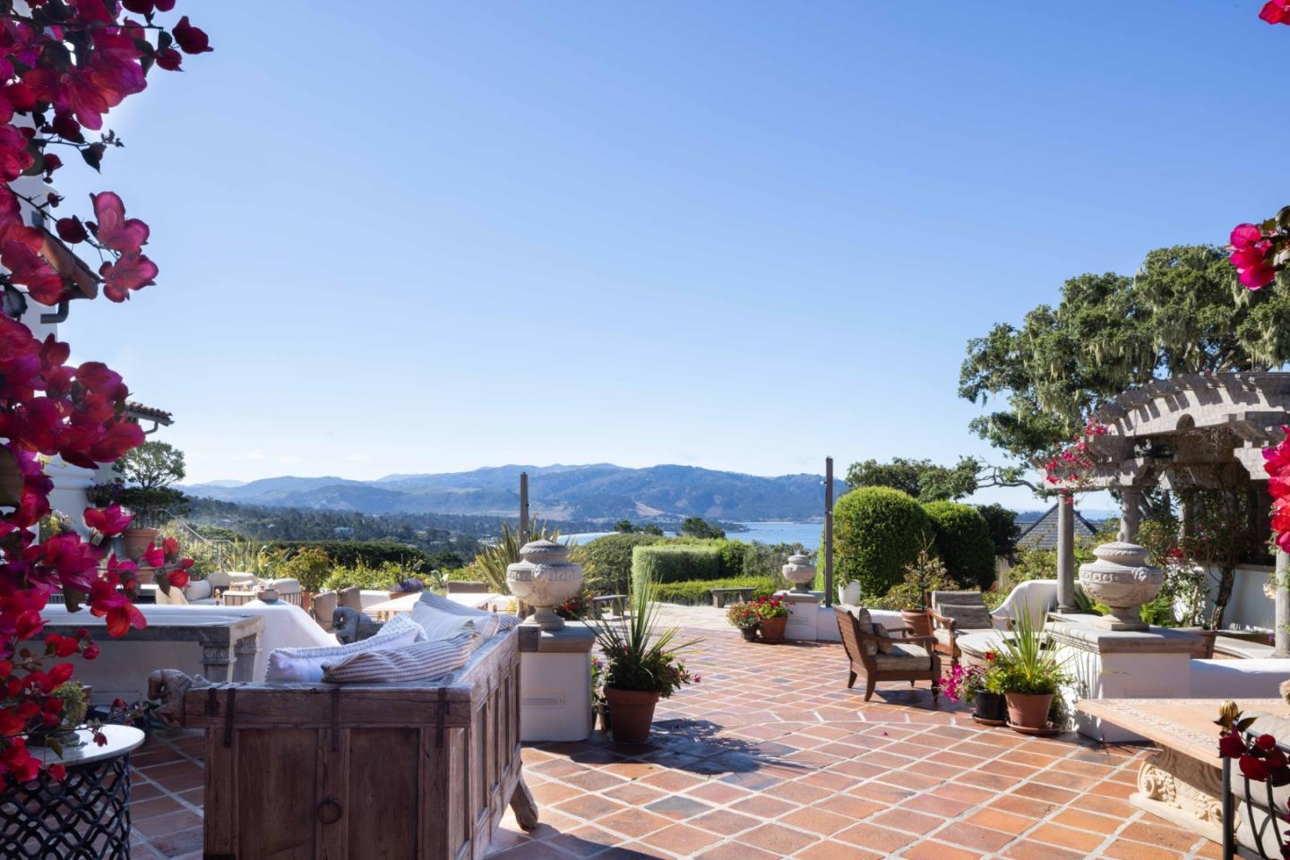 1463 Oleada Road Pebble Beach, CA 93953 - Photo 10 of 68 a view of a patio with furniture and a potted plant