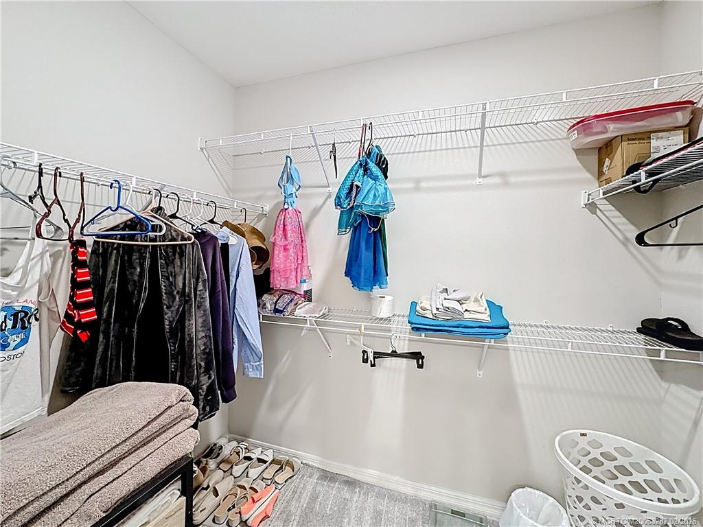 4341 Southwest Appleseed Road Port St. Lucie, FL 34953 - Photo 10 of 25 a walk in closet