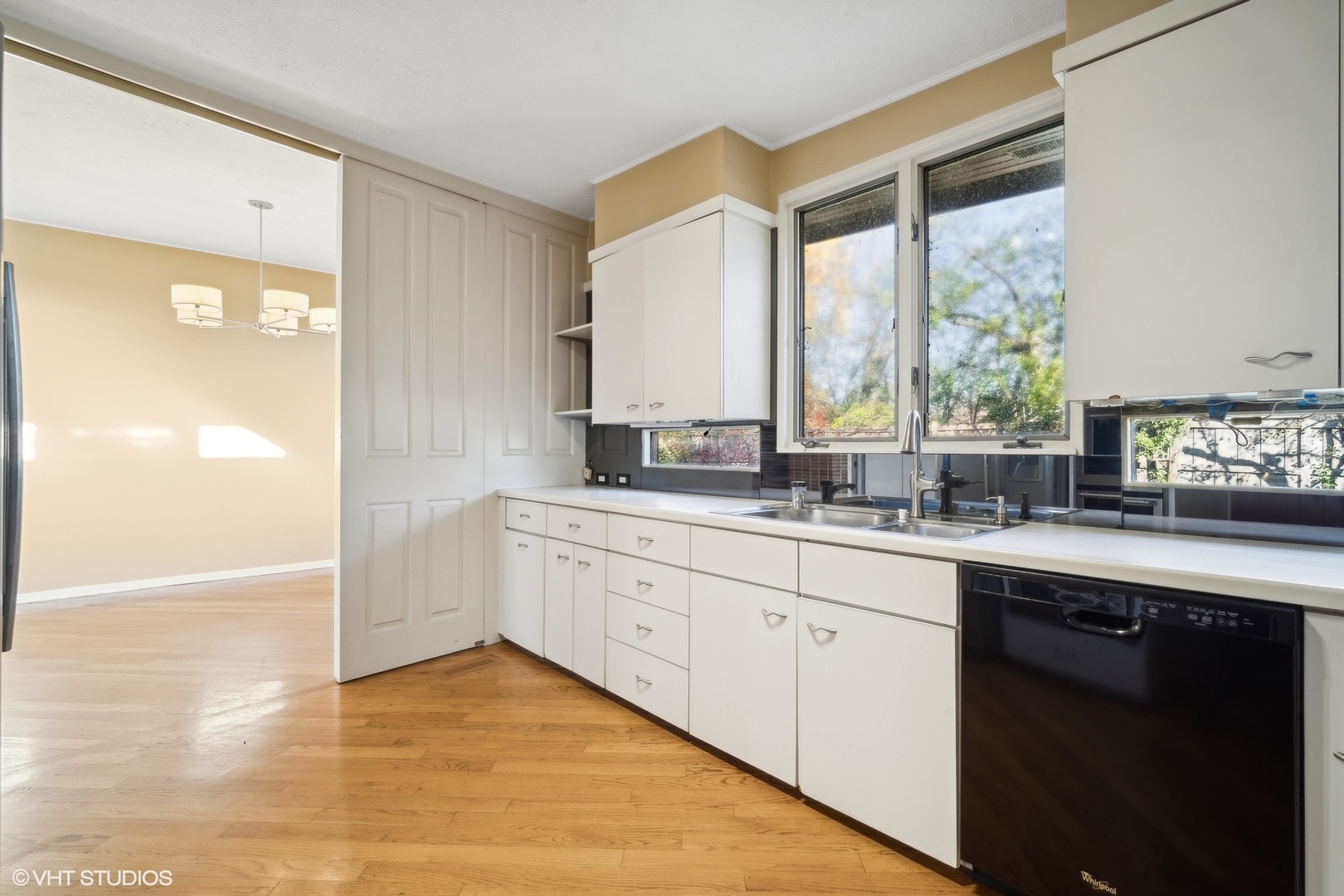 800 Edgewood Lane Glenview, IL 60025 - Photo 10 of 20 a kitchen with granite countertop a sink and a stove top oven